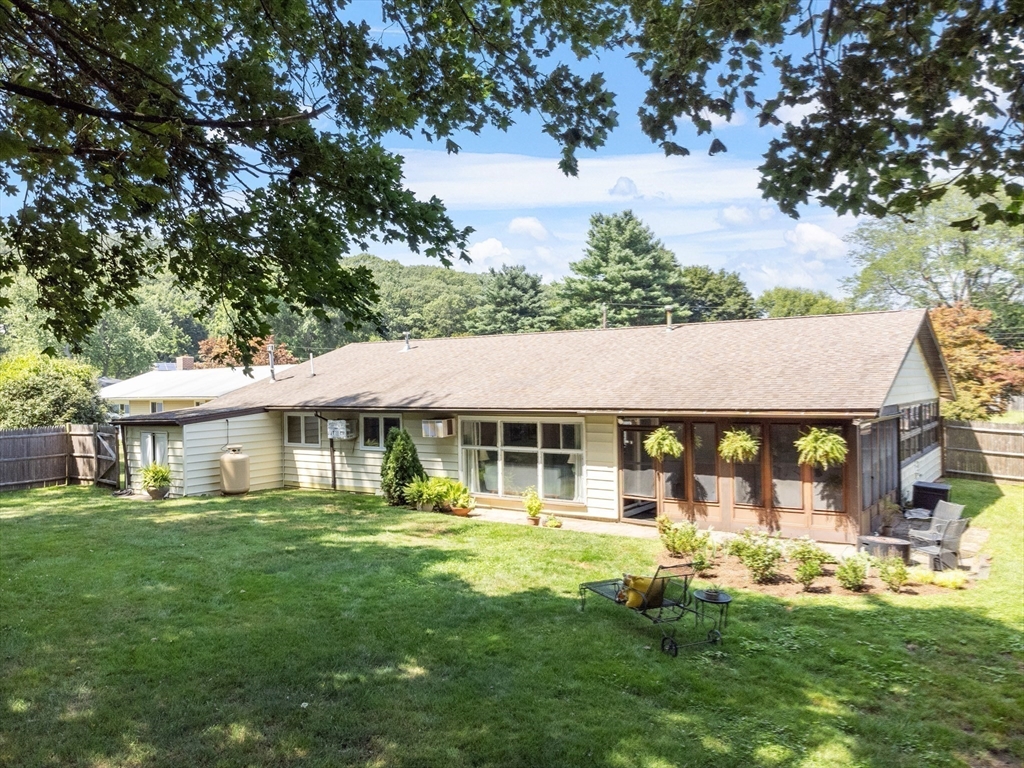 52 Lohnes Road Framingham, MA 01701 - Photo 29 of 34 a front view of a house with a garden