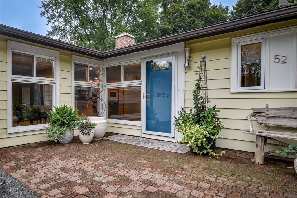 52 Lohnes Road Framingham, MA 01701 - Photo 33 of 34 a front view of a house with a yard
