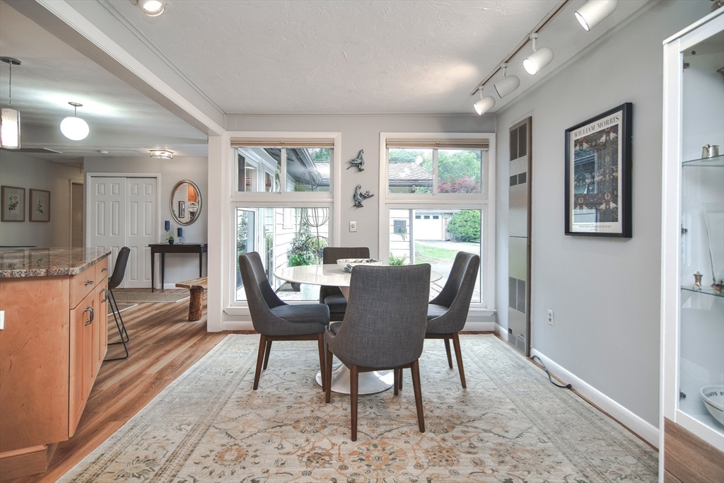 52 Lohnes Road Framingham, MA 01701 - Photo 5 of 34 a dining room with furniture a rug and wooden floor