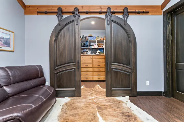 a view of livingroom with furniture and refrigerator