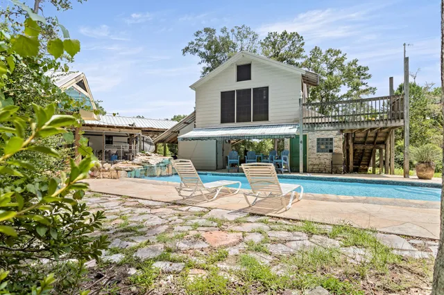 a view of house with outdoor space and sitting space