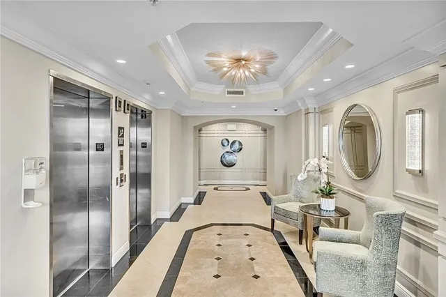 a view of living room with granite countertop furniture and a fireplace