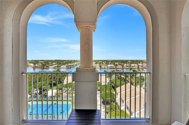 a view of living room filled with furniture and window