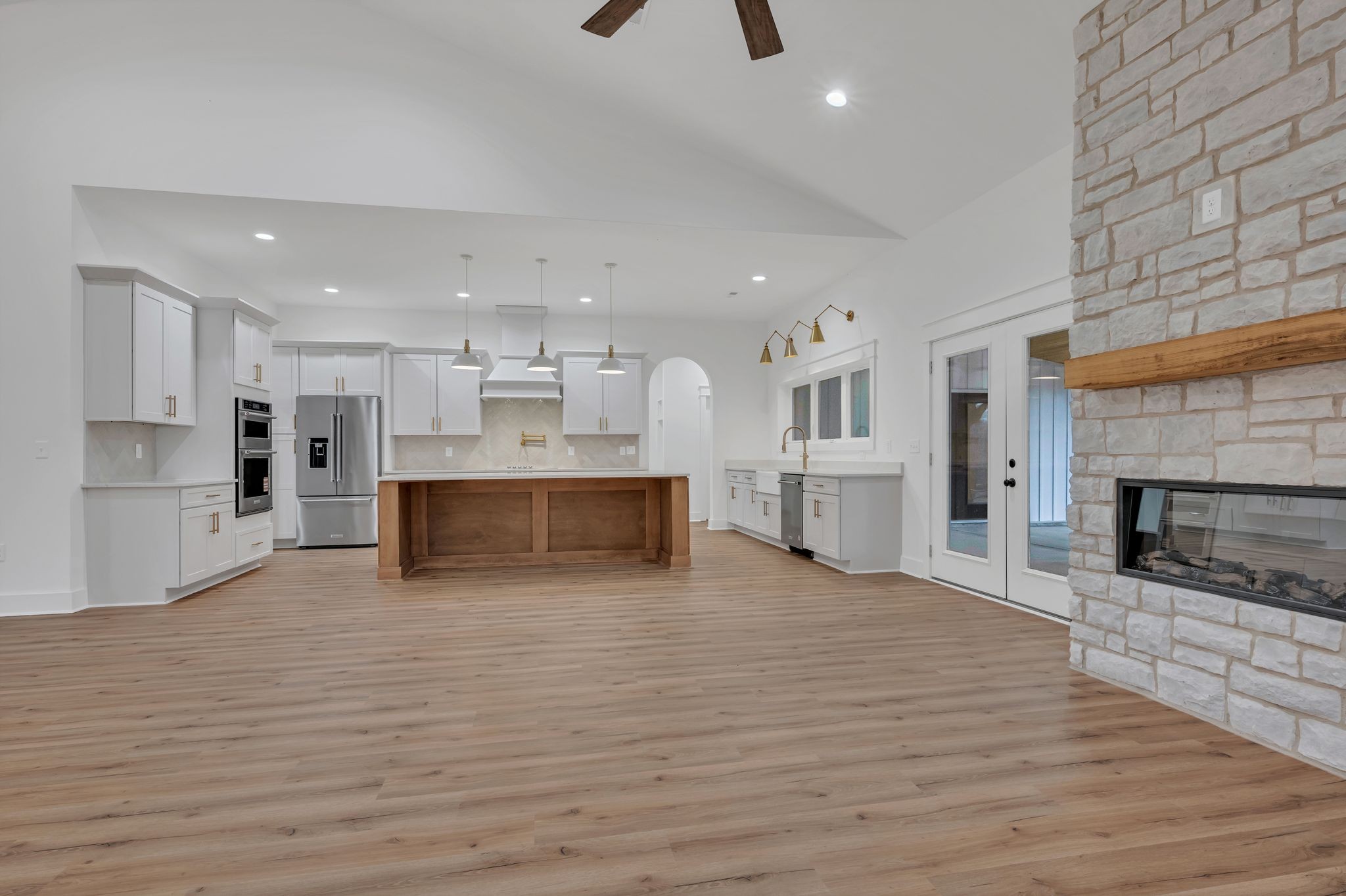 2024 Trace Creek Road Centerville, TN 37033 - Photo 15 of 51 a view of kitchen with kitchen island wooden floor center island and stainless steel appliances