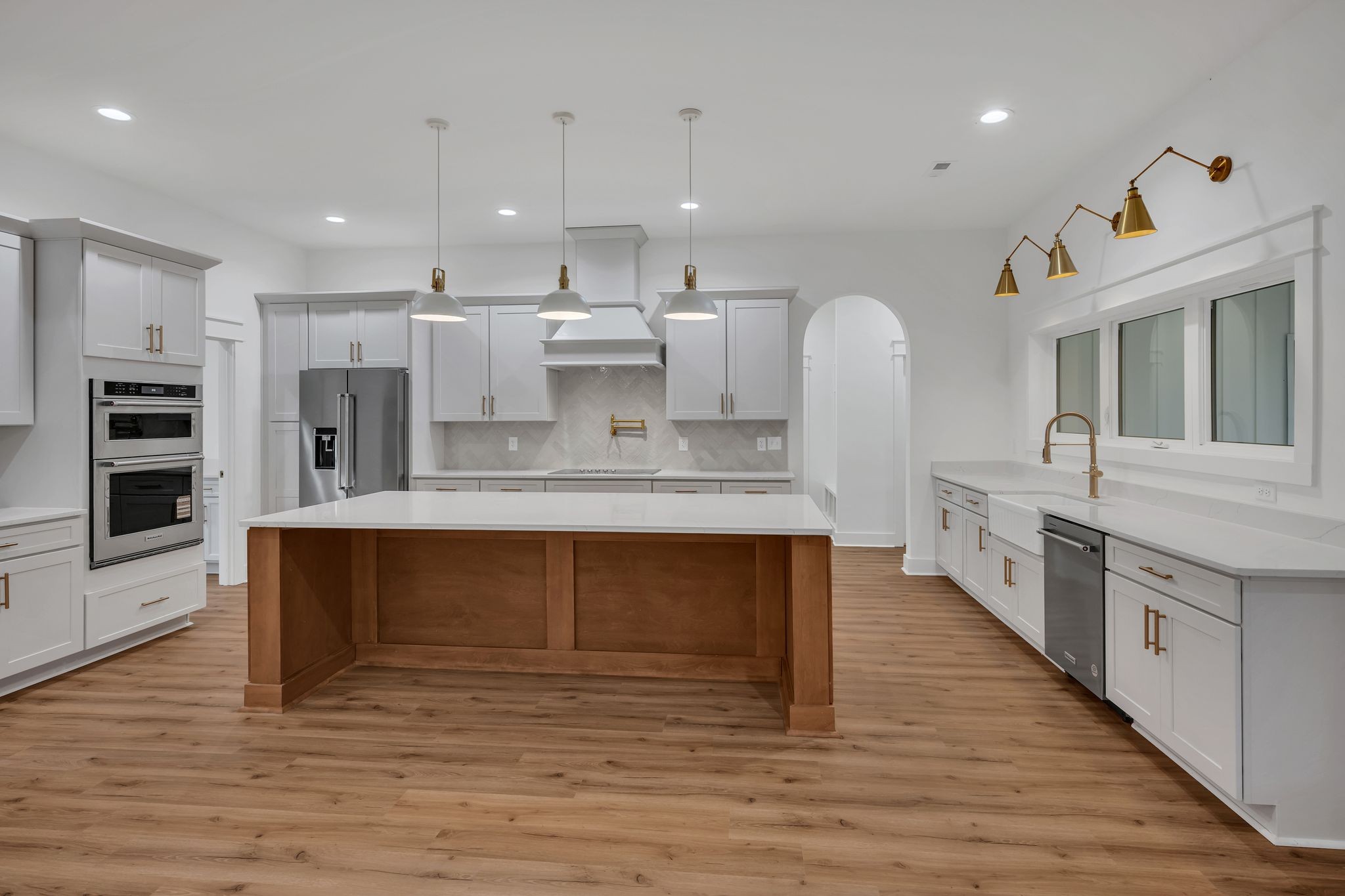 2024 Trace Creek Road Centerville, TN 37033 - Photo 16 of 51 a large kitchen with stainless steel appliances kitchen island granite countertop a large counter top and stove top oven