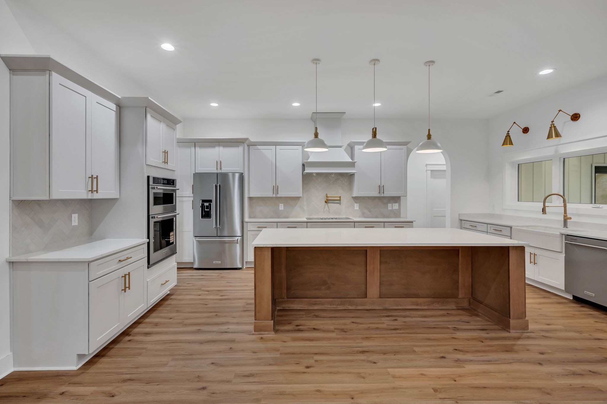 2024 Trace Creek Road Centerville, TN 37033 - Photo 17 of 51 a large kitchen with stainless steel appliances kitchen island granite countertop a large counter top and cabinets