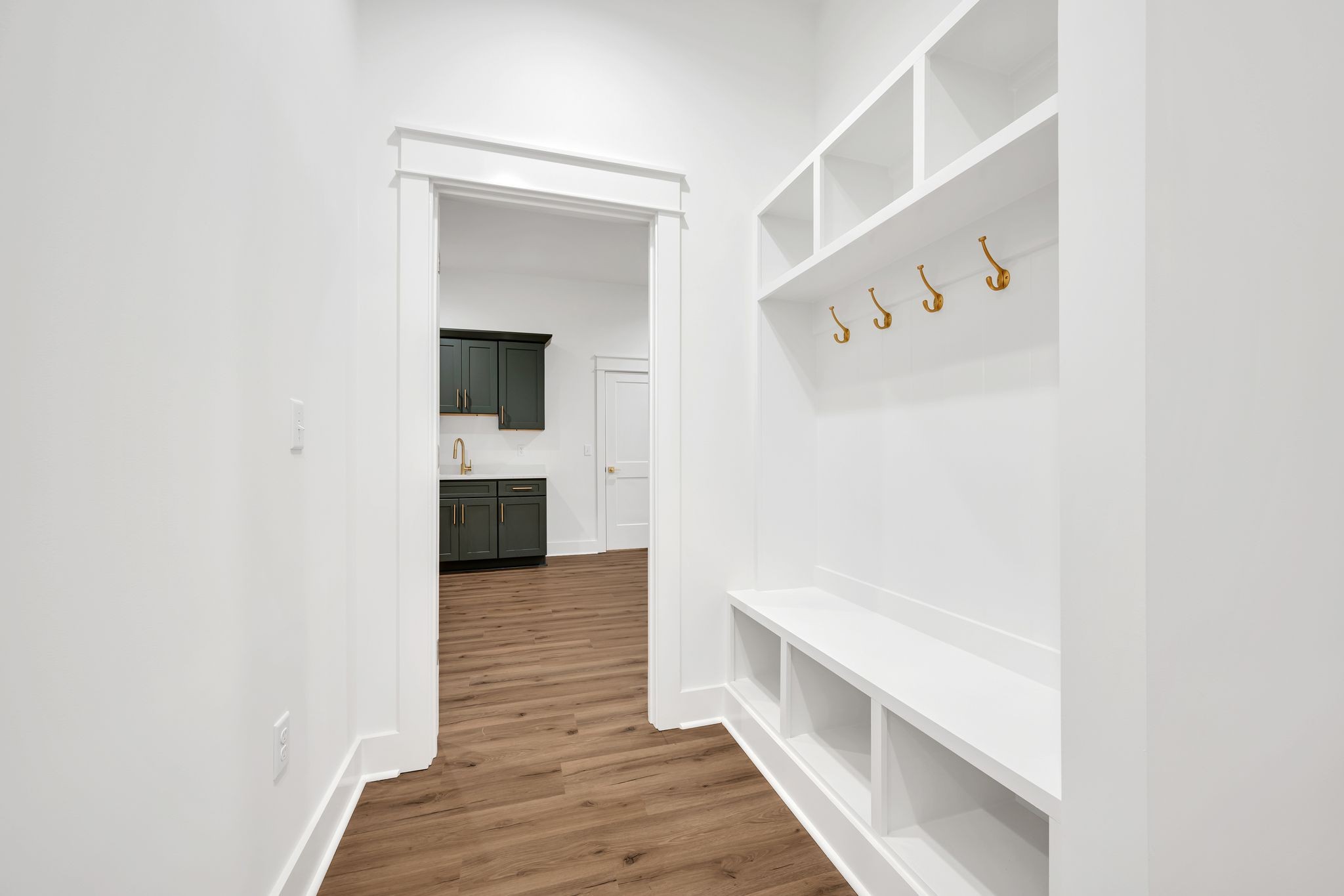 2024 Trace Creek Road Centerville, TN 37033 - Photo 22 of 51 a view of a hallway with wooden floor and staircase