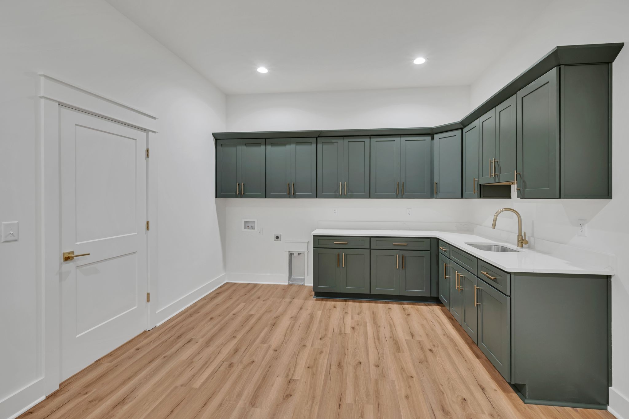2024 Trace Creek Road Centerville, TN 37033 - Photo 24 of 51 a kitchen with a sink and cabinets