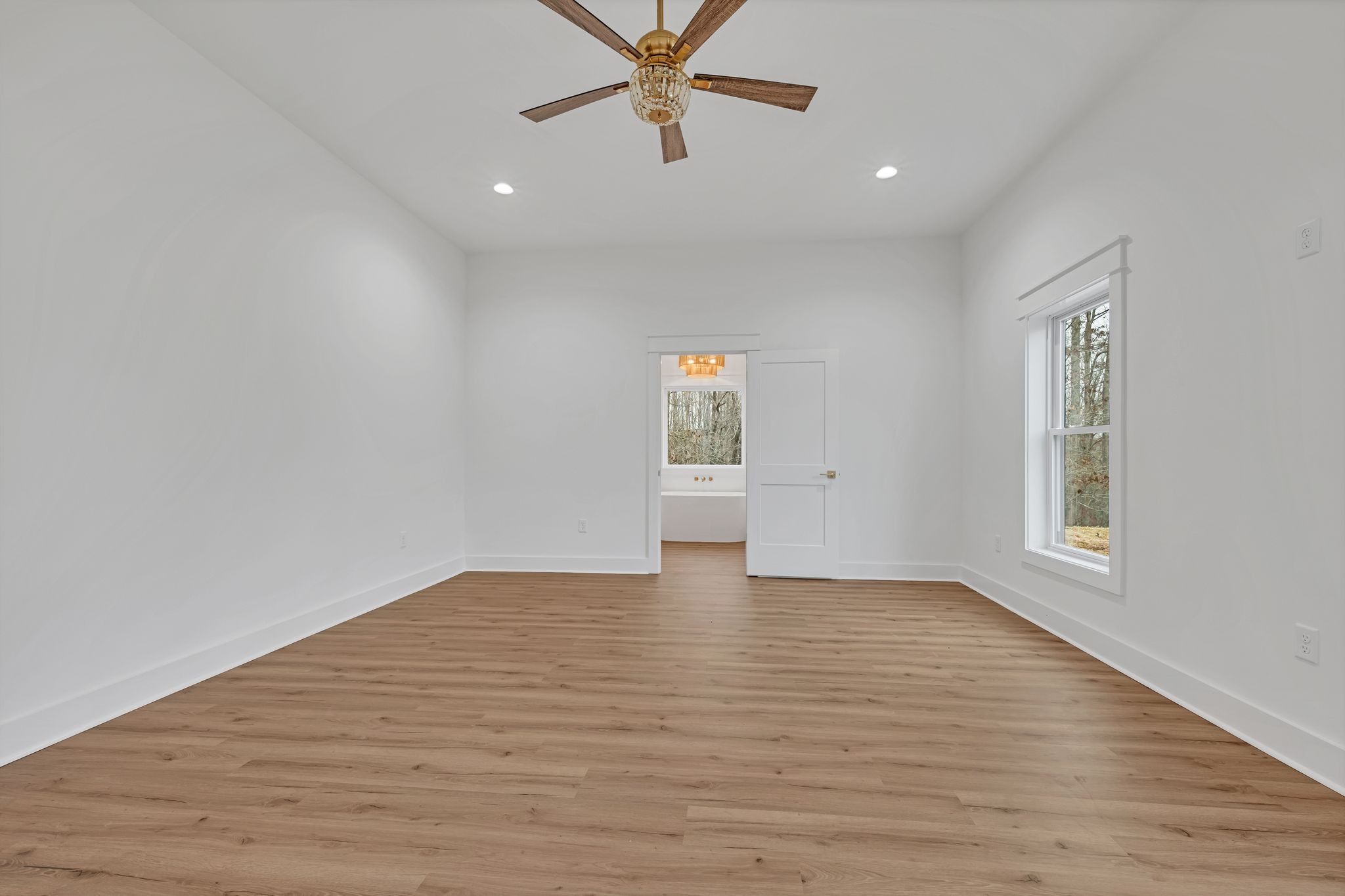 2024 Trace Creek Road Centerville, TN 37033 - Photo 28 of 51 wooden floor in an empty room with a window