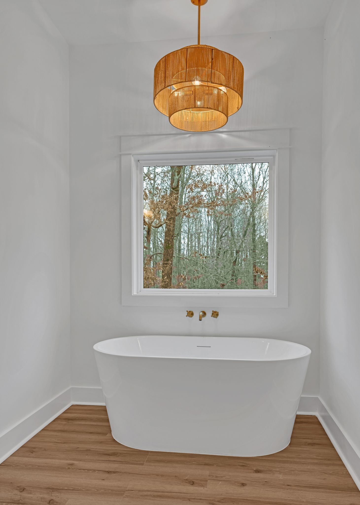 2024 Trace Creek Road Centerville, TN 37033 - Photo 29 of 51 a view of bath room with a window and chandelier