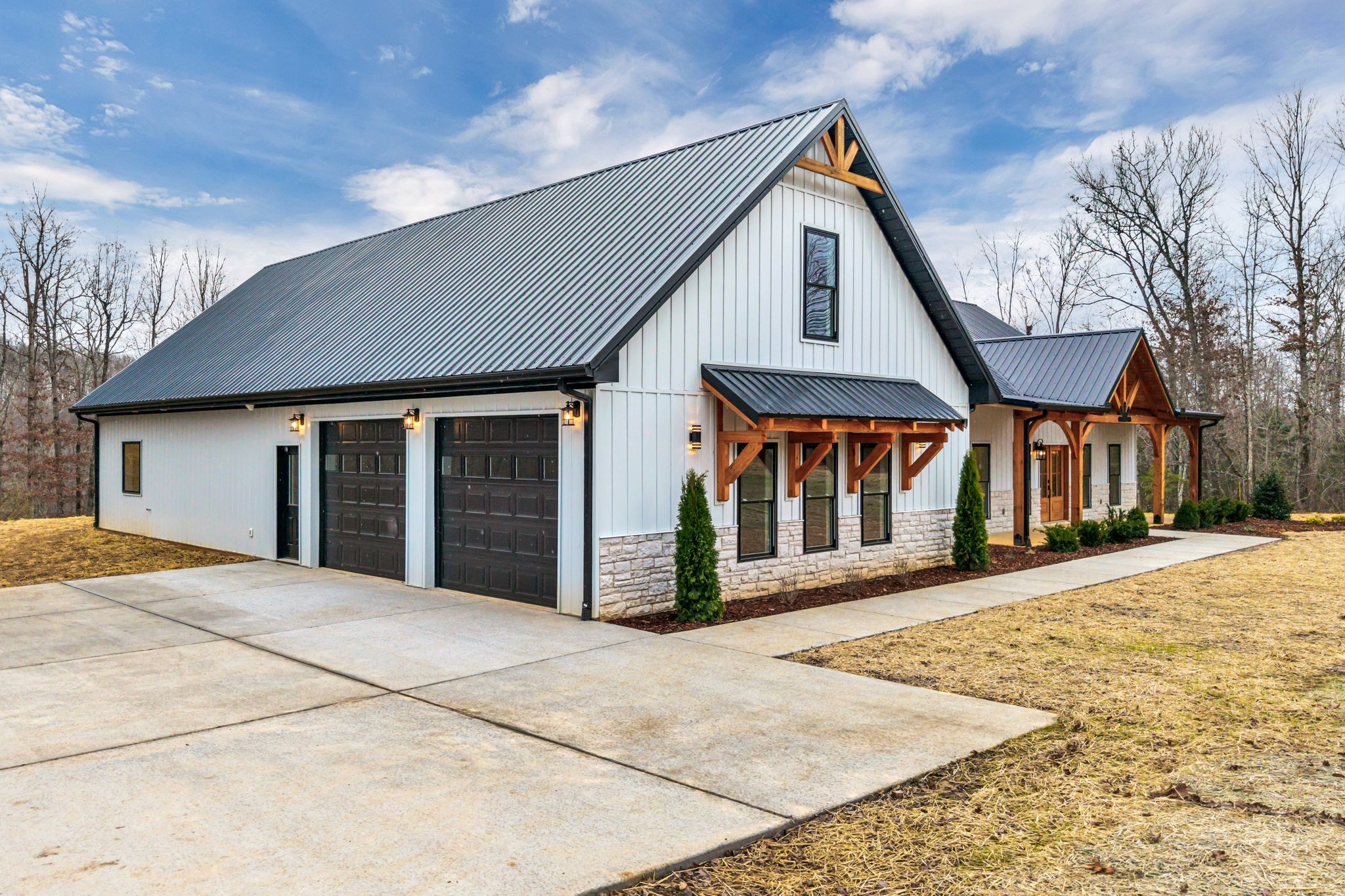 2024 Trace Creek Road Centerville, TN 37033 - Photo 3 of 51 a front view of a house with a garden