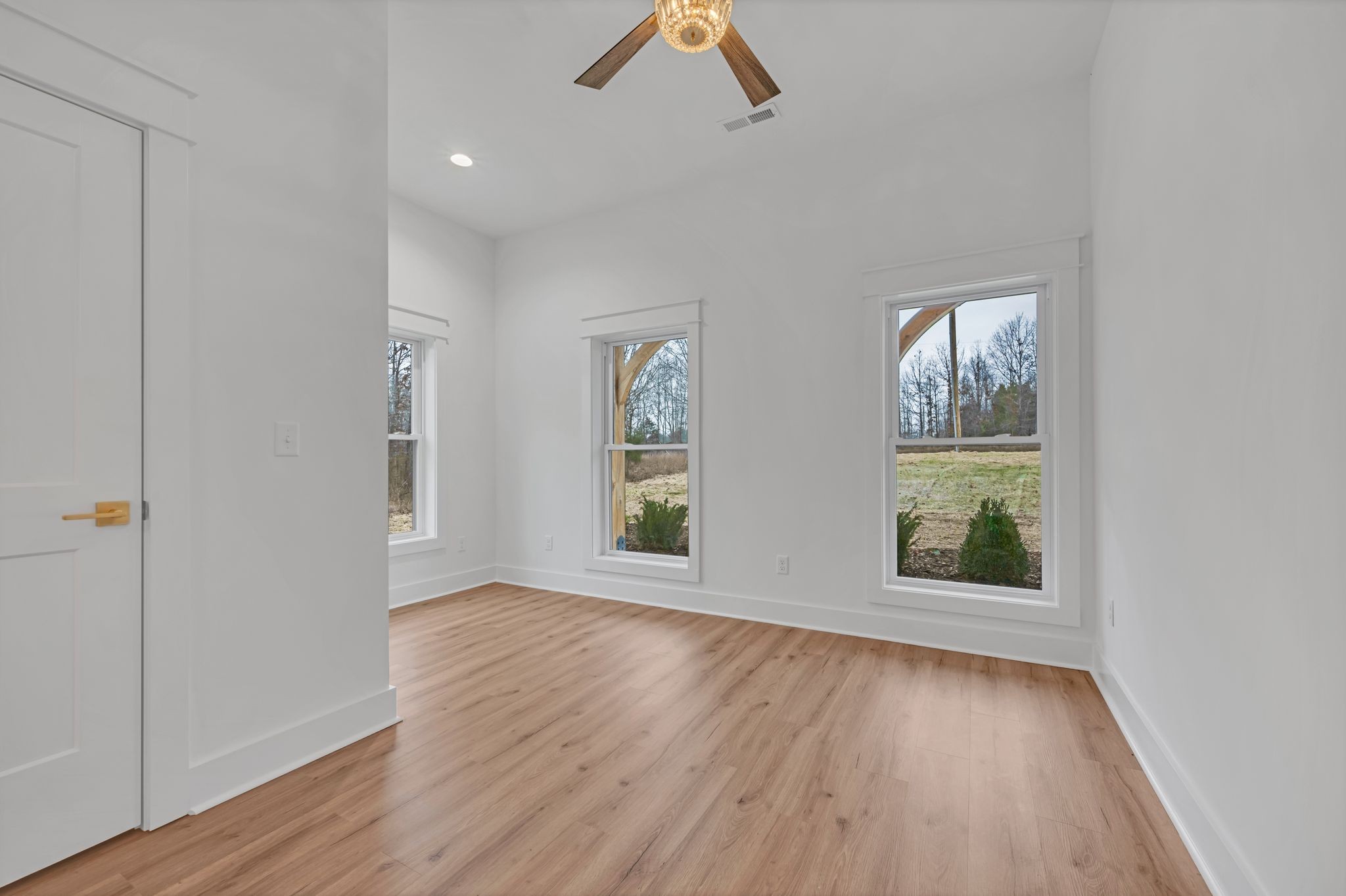 2024 Trace Creek Road Centerville, TN 37033 - Photo 34 of 51 wooden floor in an empty room with a window