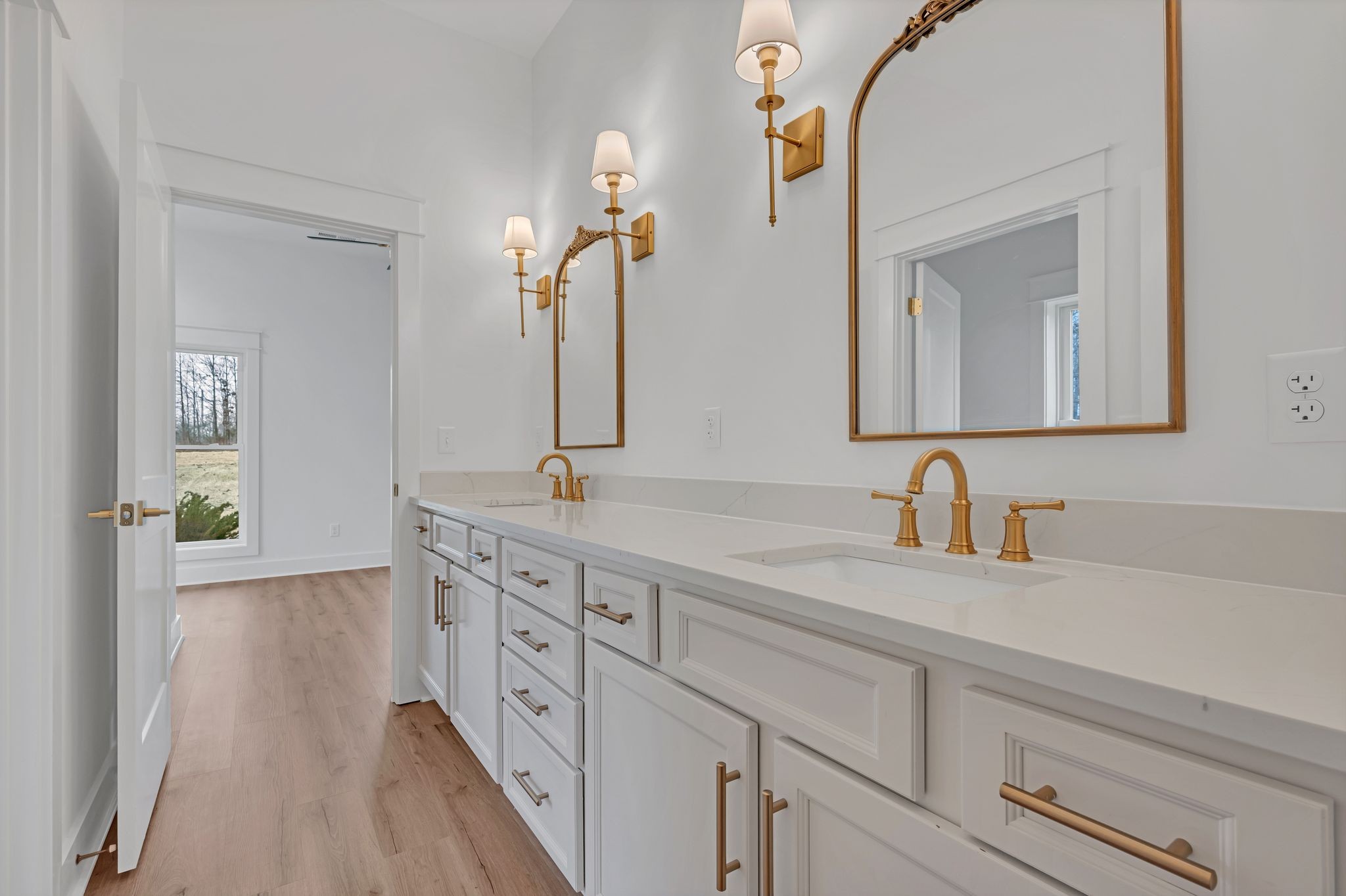 2024 Trace Creek Road Centerville, TN 37033 - Photo 37 of 51 a bathroom with a double vanity sink and a mirror