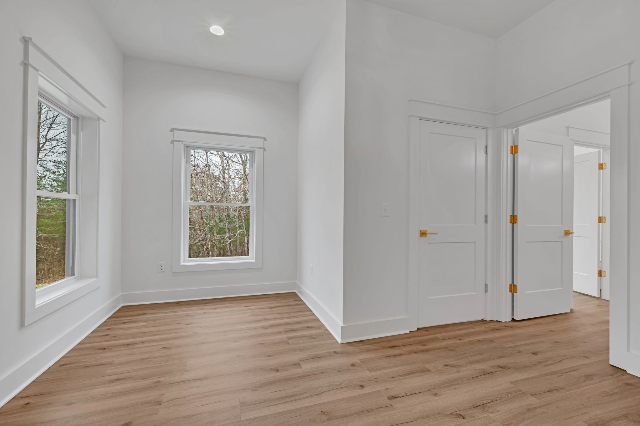 2024 Trace Creek Road Centerville, TN 37033 - Photo 40 of 51 a view of an empty room with wooden floor and a window
