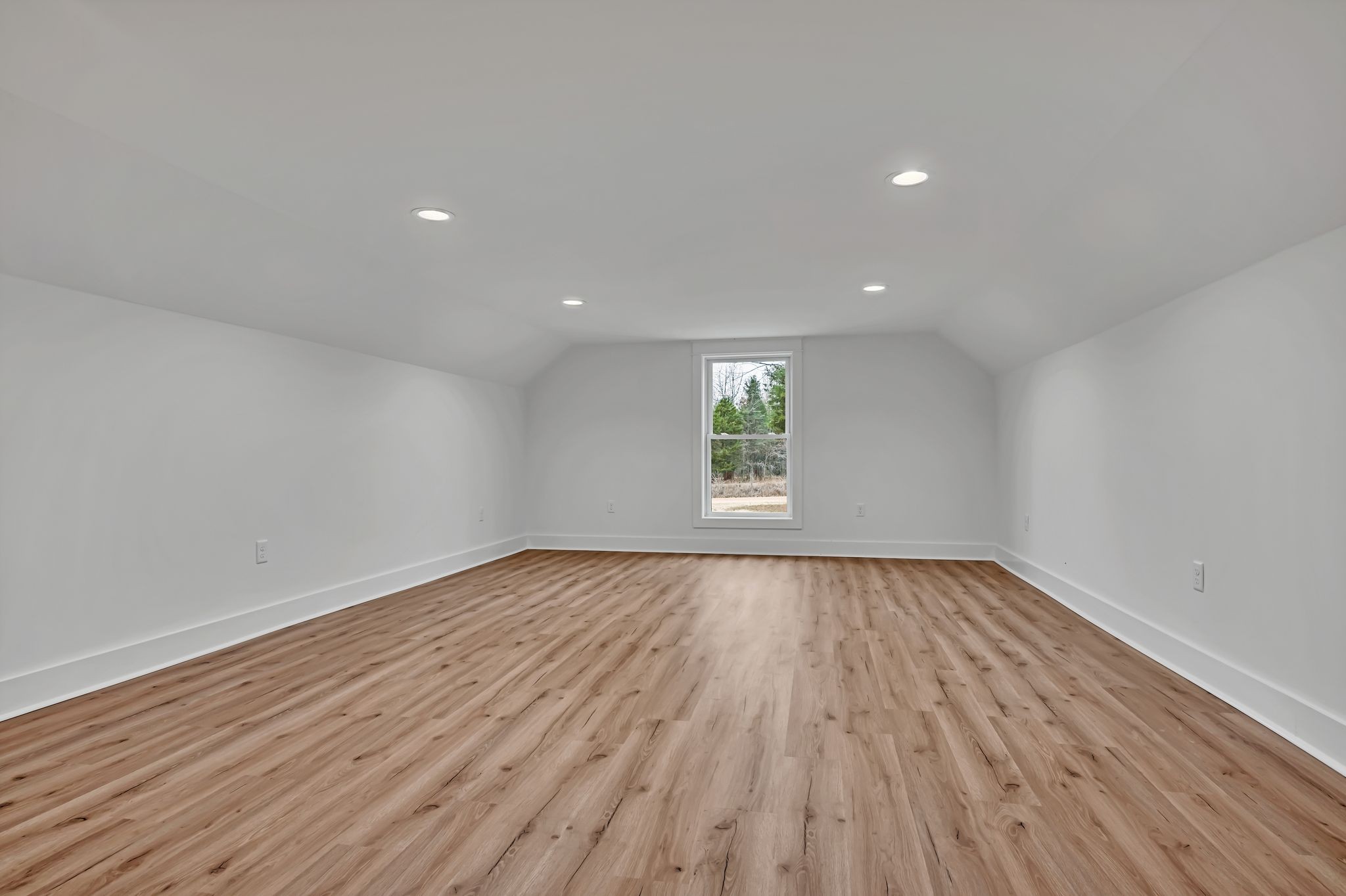 2024 Trace Creek Road Centerville, TN 37033 - Photo 43 of 51 an empty room with wooden floor and windows
