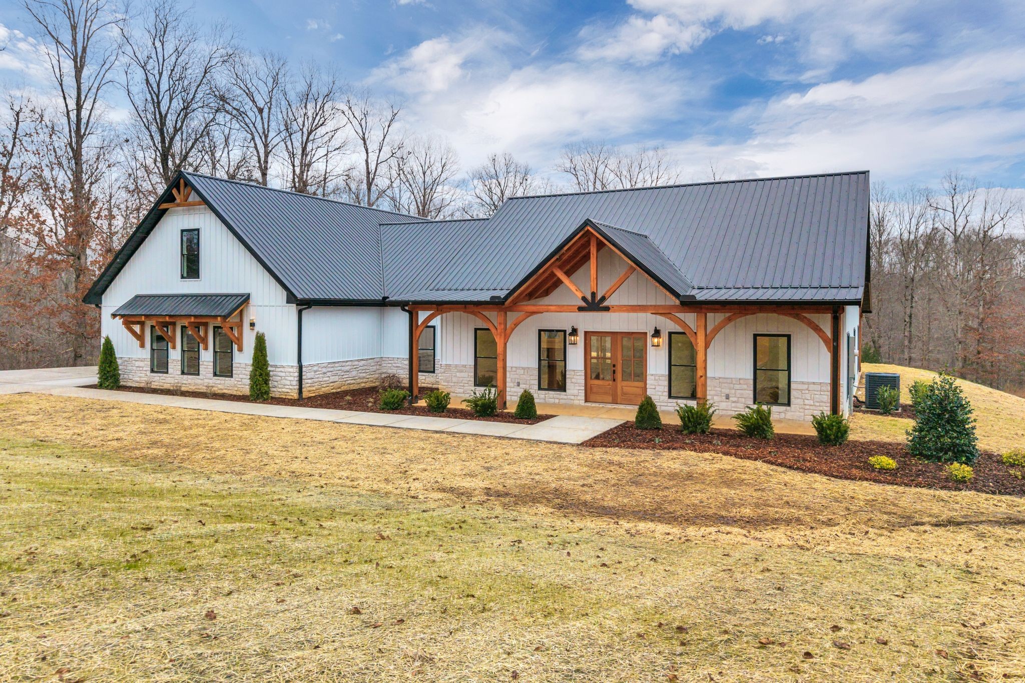 2024 Trace Creek Road Centerville, TN 37033 - Photo 5 of 51 a front view of a house with a yard