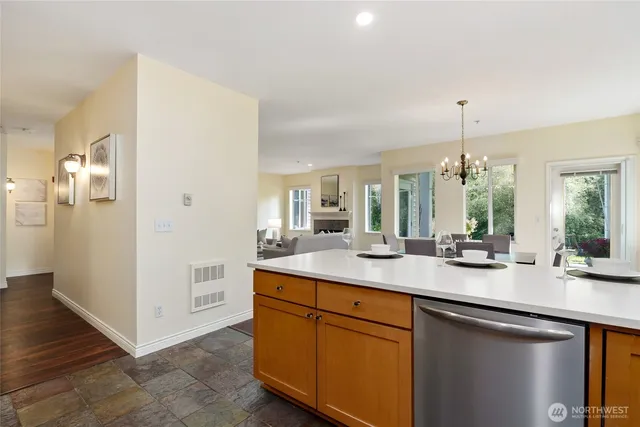 a kitchen with sink and cabinets