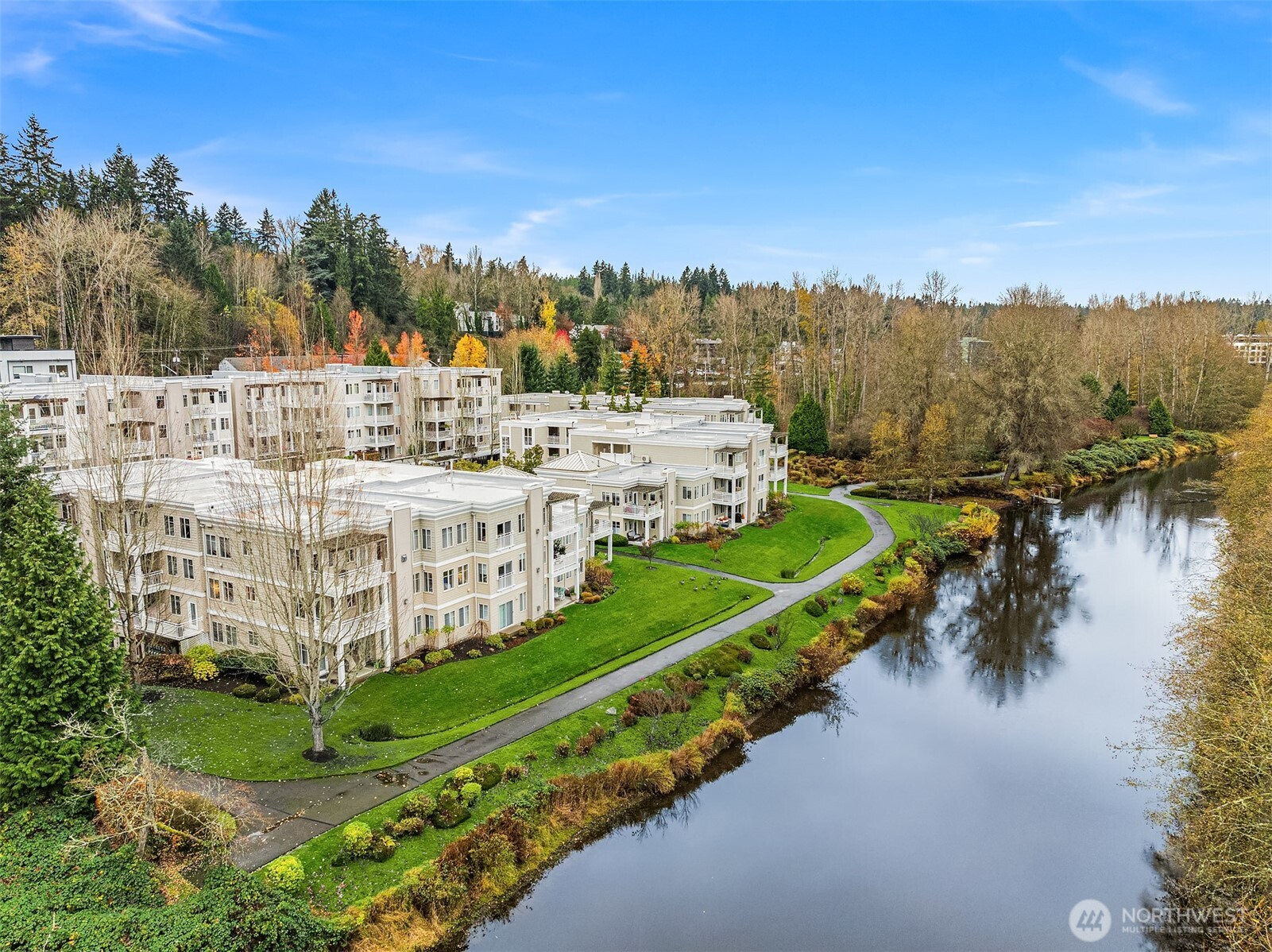 17432 Bothell Way Northeast, Unit B106 Bothell, WA 98011 - Photo 3 of 23 a view of a city with tall buildings and lake view