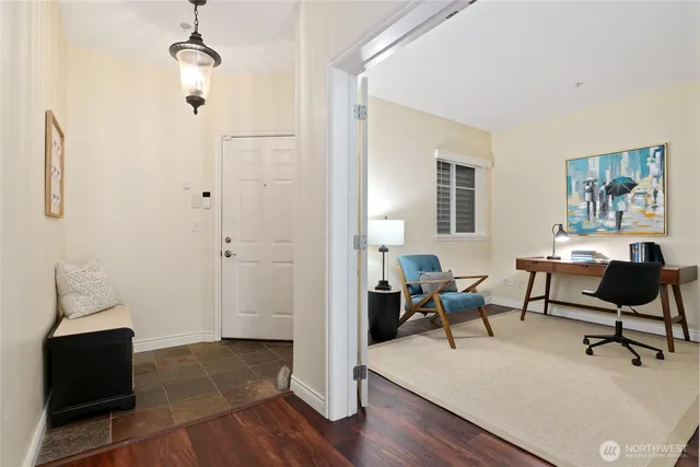 a living room with furniture and a window