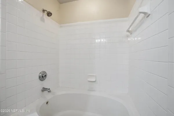 a bathroom with a bathtub