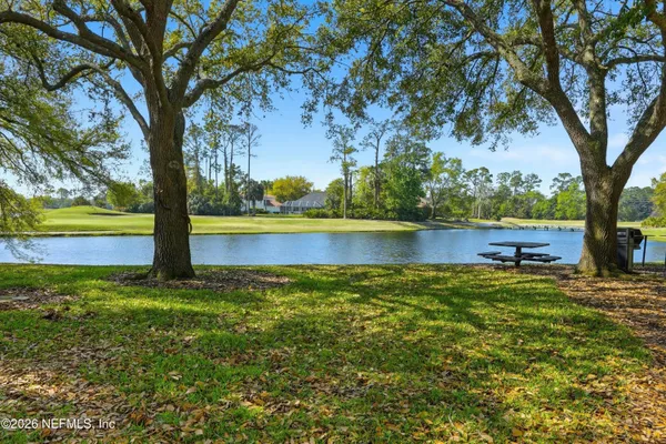 a view of a yard with an outdoor space
