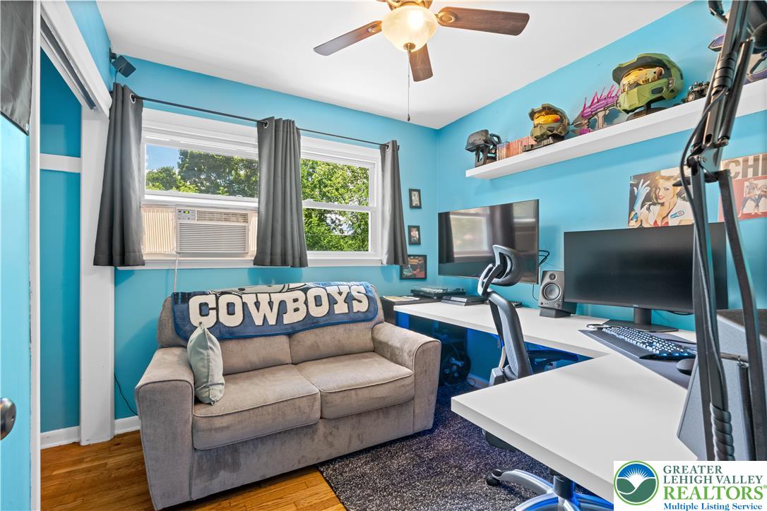 50 Kohls Road Northampton, PA 18067 - Photo 24 of 54 Hardwood floors and a ceiling fan create a comfortable atmosphere for work or relaxation in this versatile room.