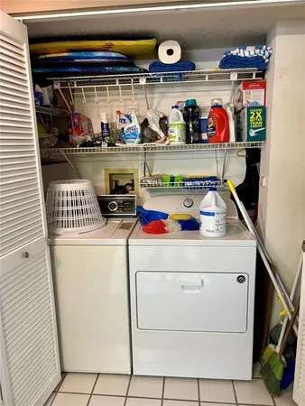 a kitchen with appliances cabinets and a sink