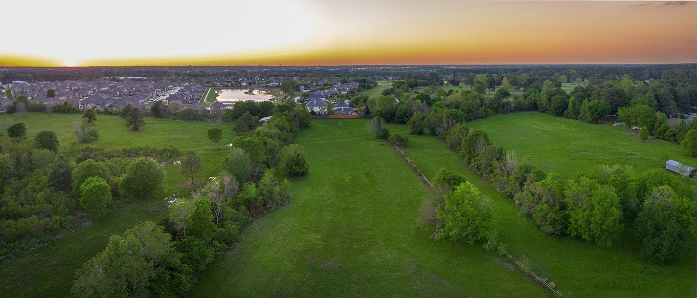 11000 Spell Road Tomball, TX 77375 - Photo 3 of 8 a view of a city with lush green forest