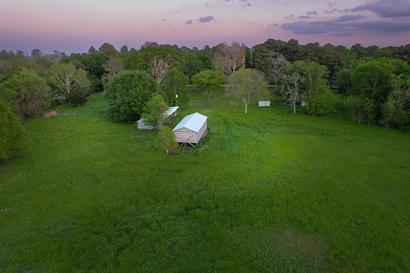 11000 Spell Road Tomball, TX 77375 - Photo 5 of 8 a view of a golf course with a lake