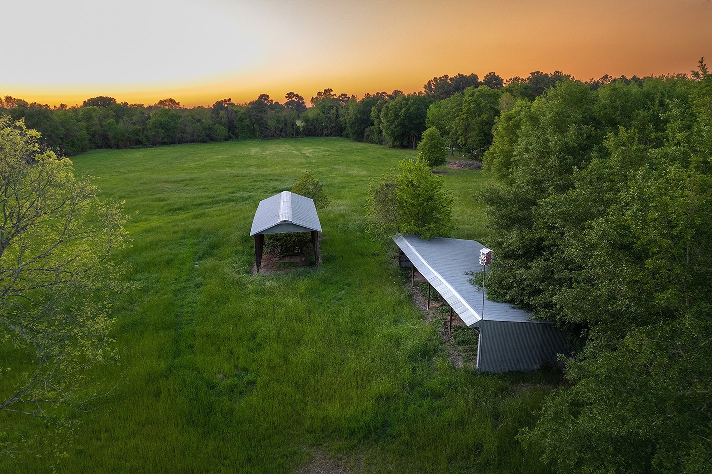 11000 Spell Road Tomball, TX 77375 - Photo 6 of 8 a view of a two chairs in a big yard