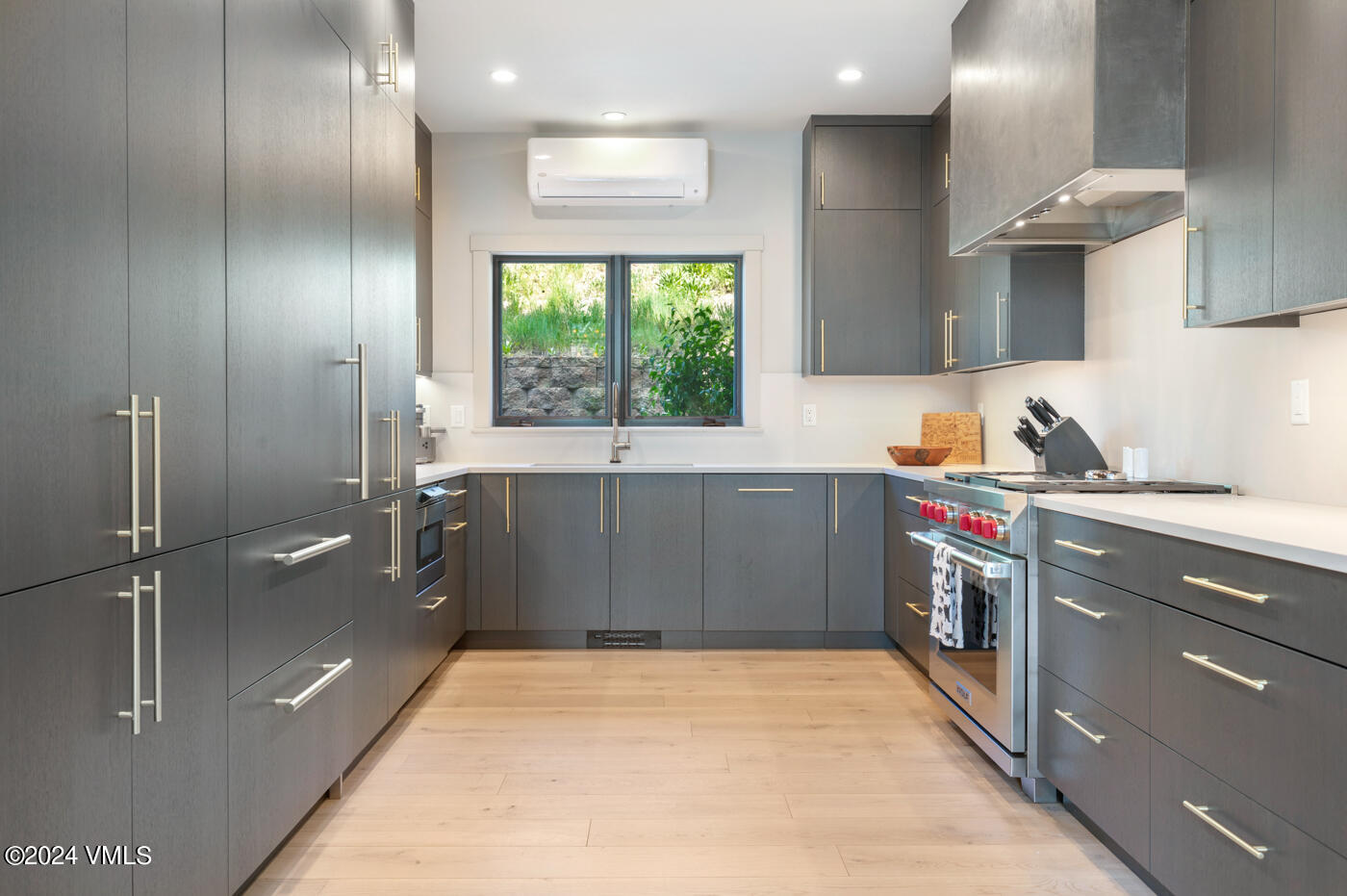 92 Knudson Ranch Road Edwards, CO 81632 - Photo 14 of 37 a kitchen with a refrigerator and window