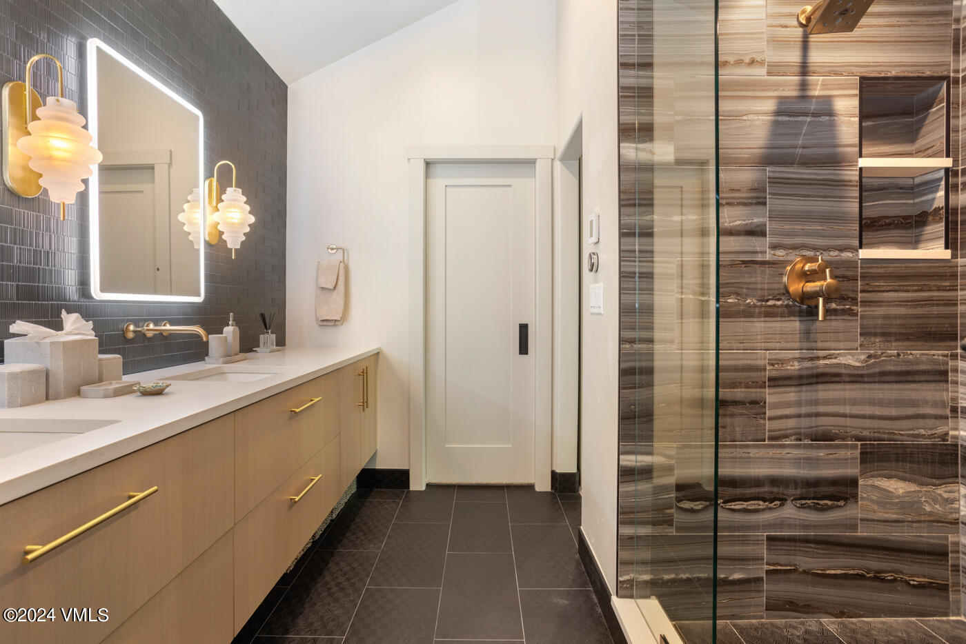 92 Knudson Ranch Road Edwards, CO 81632 - Photo 24 of 37 a bathroom with a shower and a sink