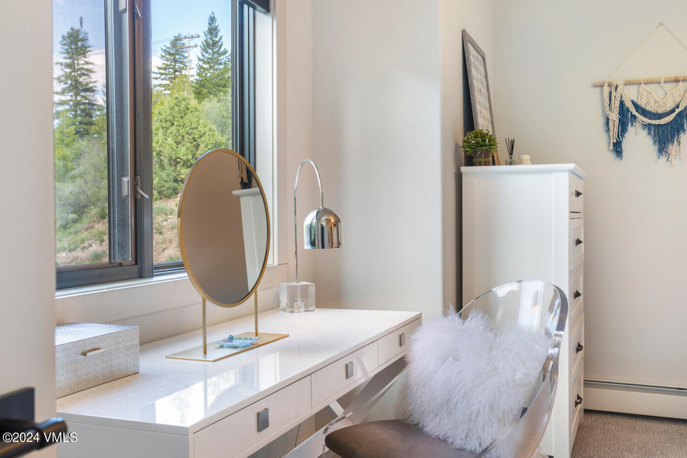 92 Knudson Ranch Road Edwards, CO 81632 - Photo 27 of 37 a view of a dining room with furniture window and outside view