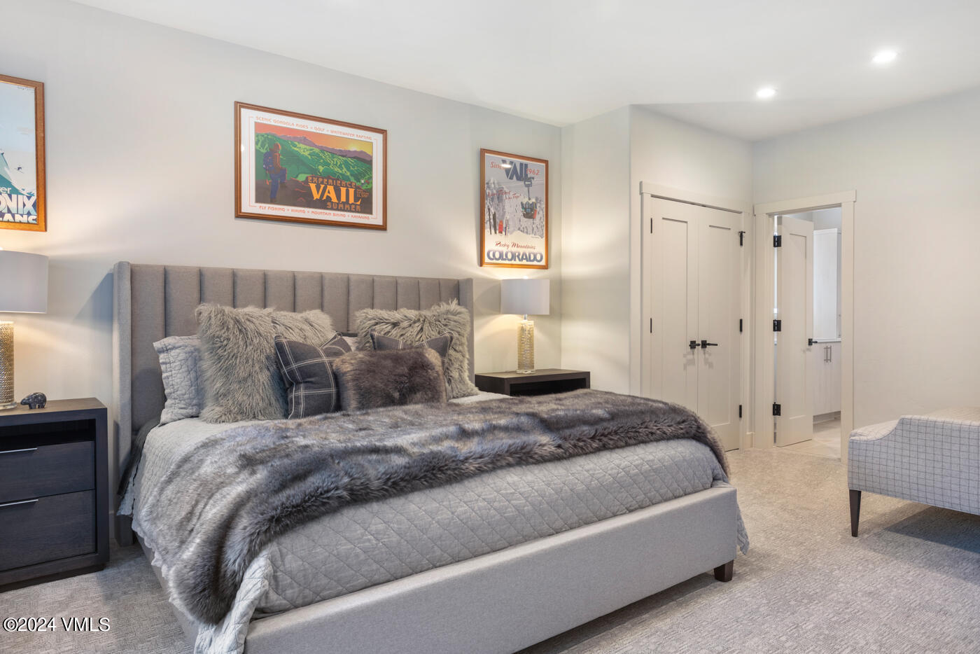 92 Knudson Ranch Road Edwards, CO 81632 - Photo 33 of 37 a bedroom with a bed and a painting on the wall