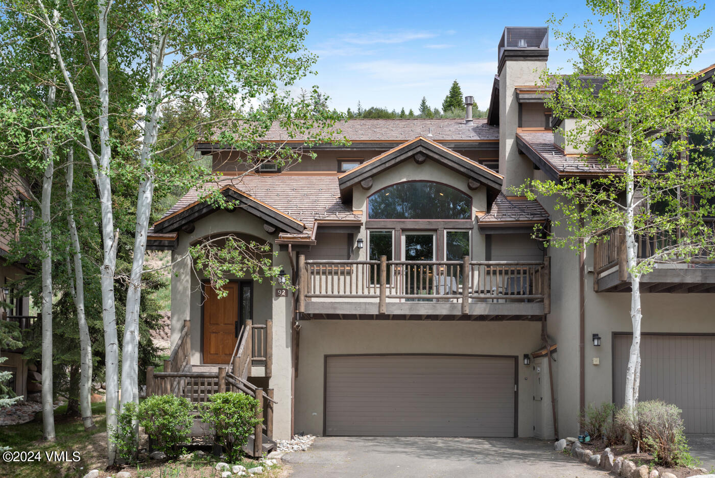 92 Knudson Ranch Road Edwards, CO 81632 - Photo 36 of 37 a front view of a house with a yard