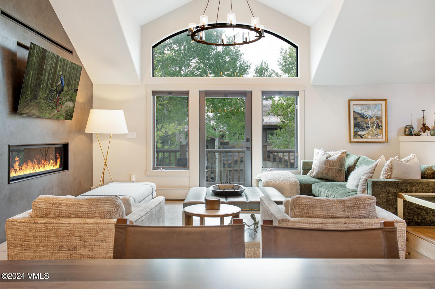 92 Knudson Ranch Road Edwards, CO 81632 - Photo 6 of 37 a living room with furniture and a large window