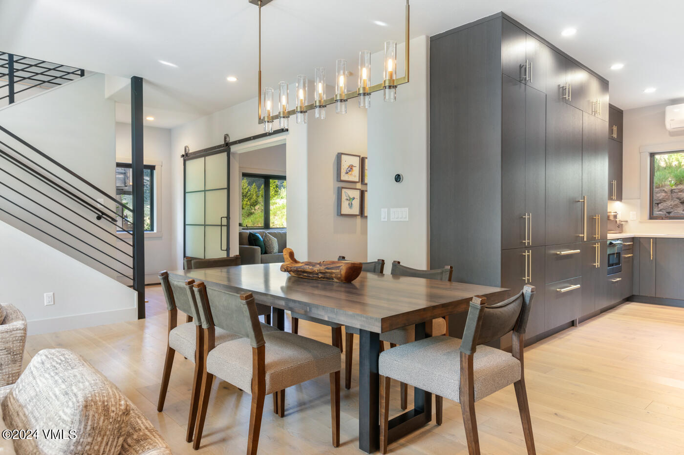 92 Knudson Ranch Road Edwards, CO 81632 - Photo 10 of 37 a dining room with a table and chairs