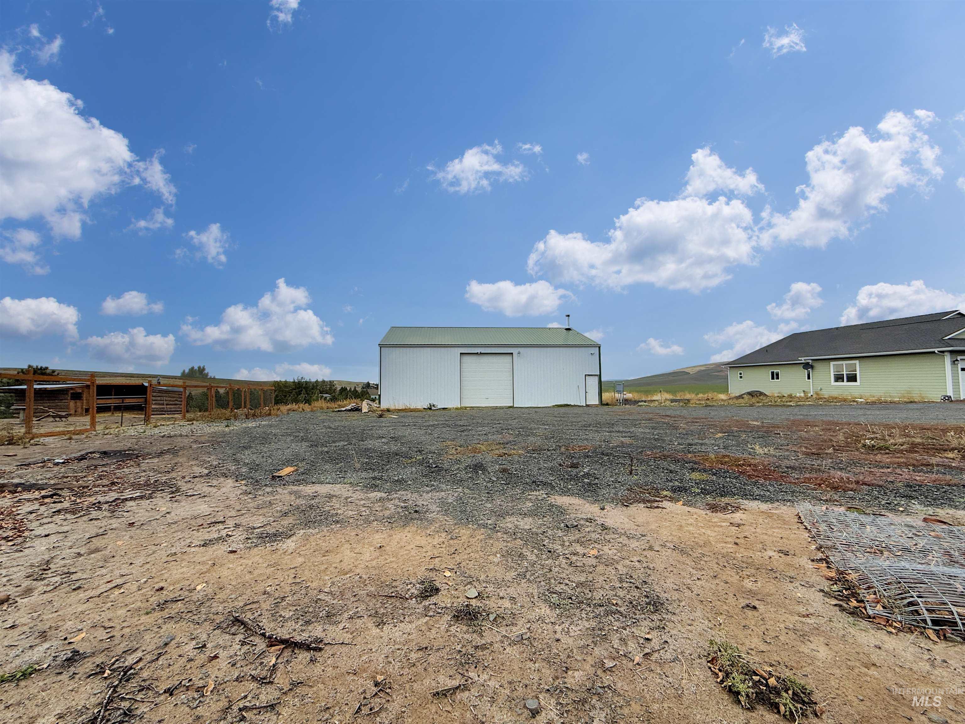 1030 Tempest Lane Viola, ID 83872 - Photo 32 of 37 View of yard featuring an outdoor structure