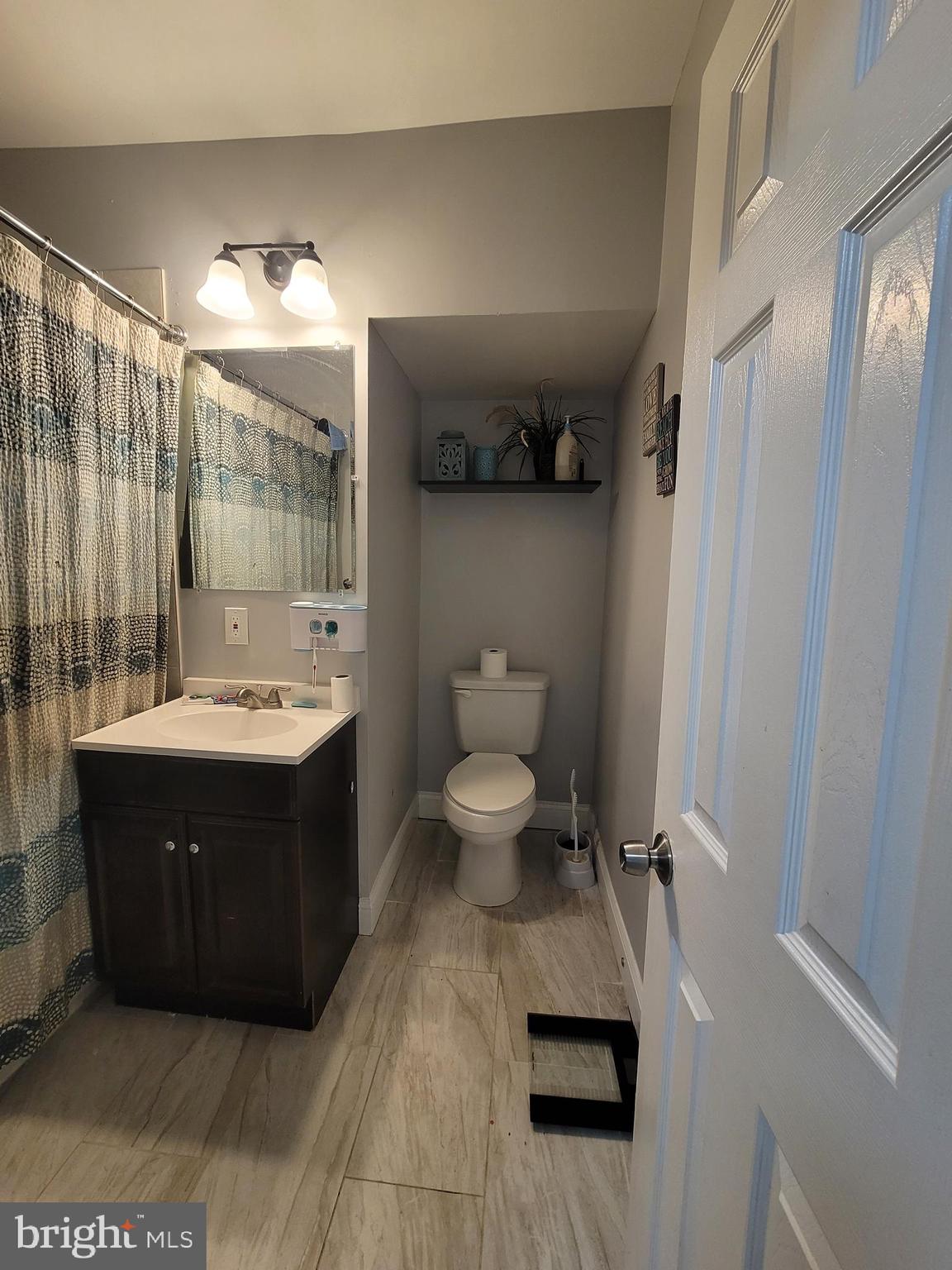 630 Wicklow Road Baltimore, MD 21229 - Photo 14 of 28 Master Hall Bath