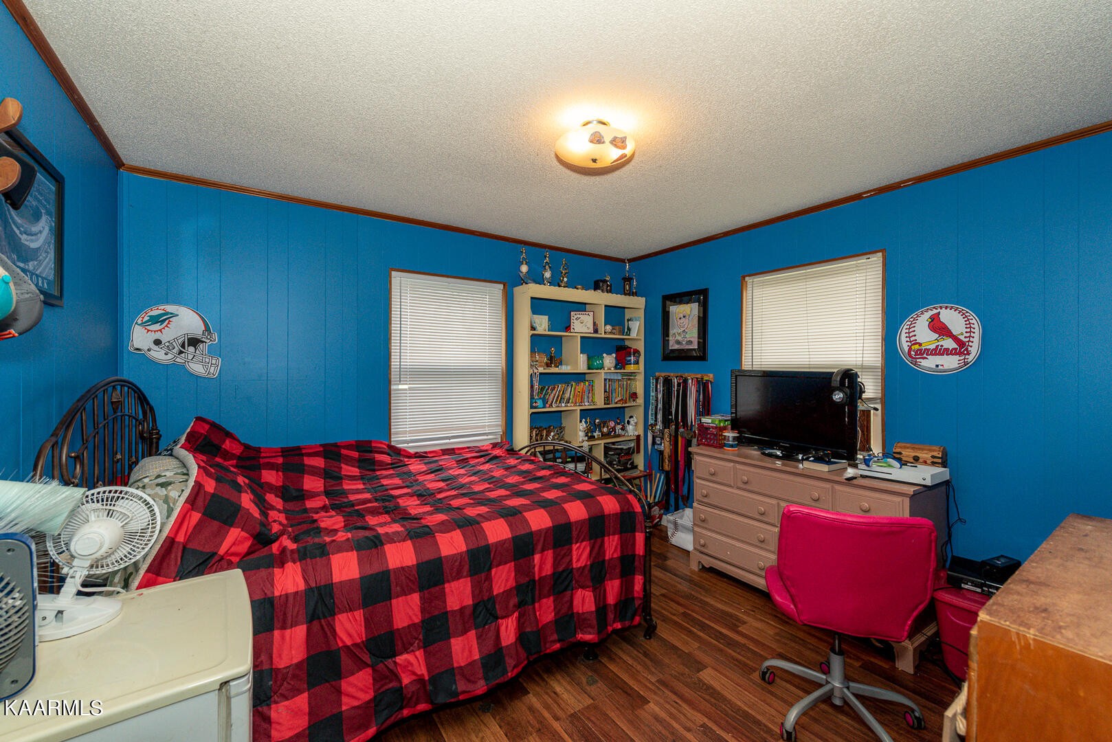 1399 Niles Ferry Road Greenback, TN 37742 - Photo 19 of 28 a bedroom with a bed and a bookshelf
