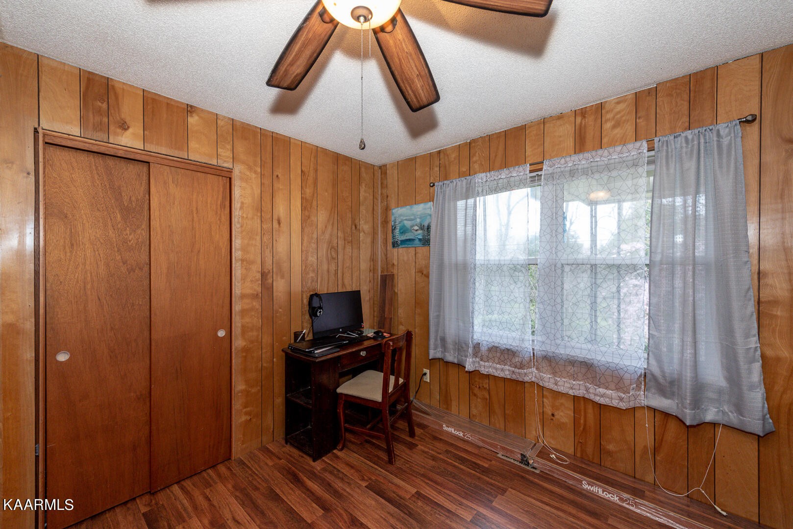 1399 Niles Ferry Road Greenback, TN 37742 - Photo 20 of 28 a very nice looking room with a large window and wooden floor
