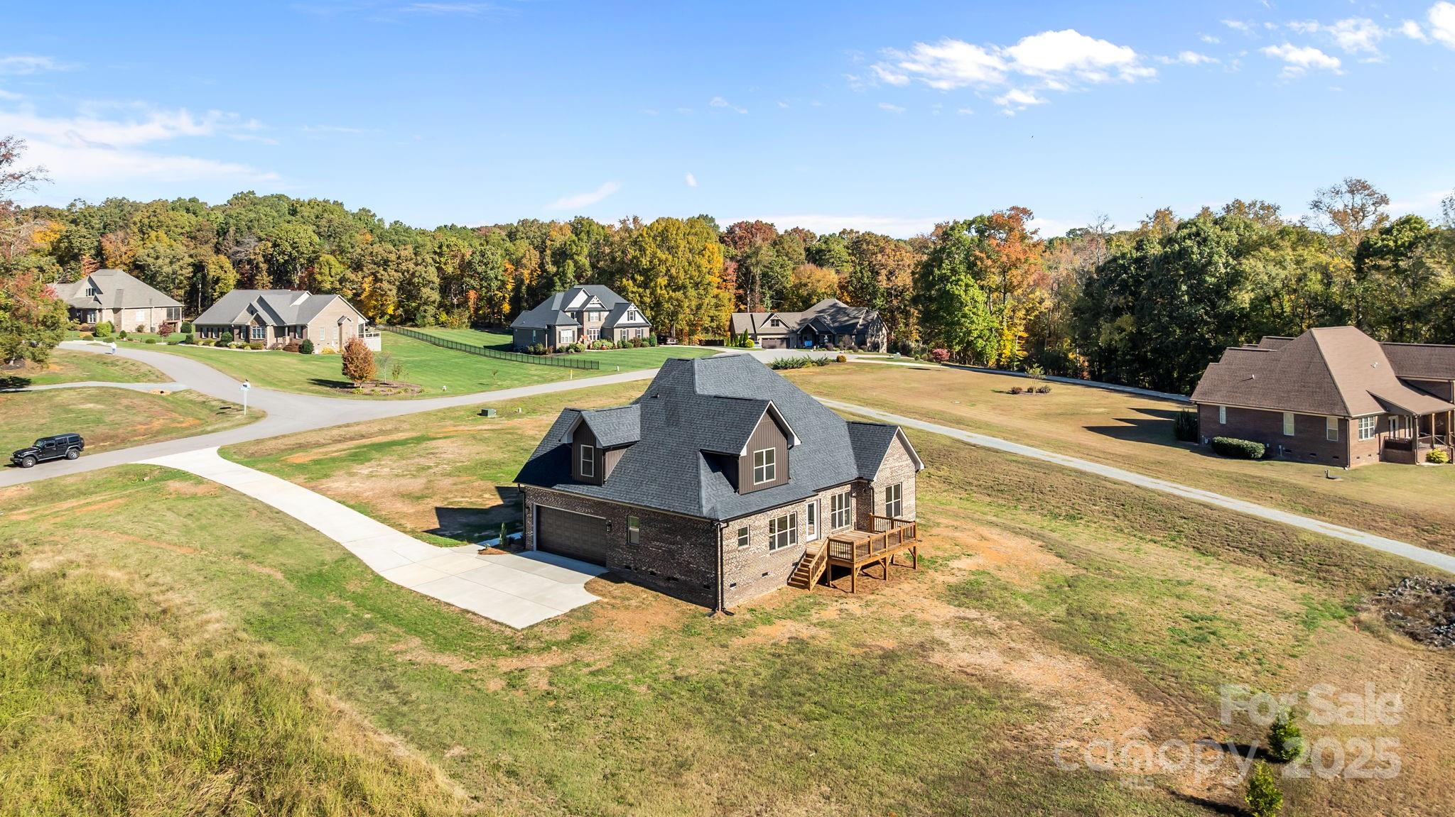 2003 Duntov Drive Monroe, NC 28110 - Photo 42 of 44 a view of a swimming pool with a yard and plants