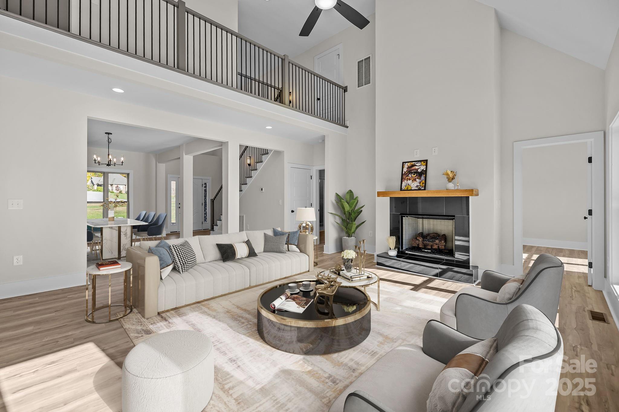 2003 Duntov Drive Monroe, NC 28110 - Photo 10 of 44 a living room with furniture and a fireplace