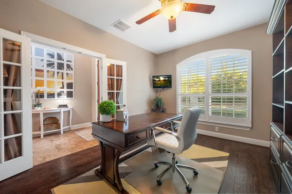 a living room with furniture and a window