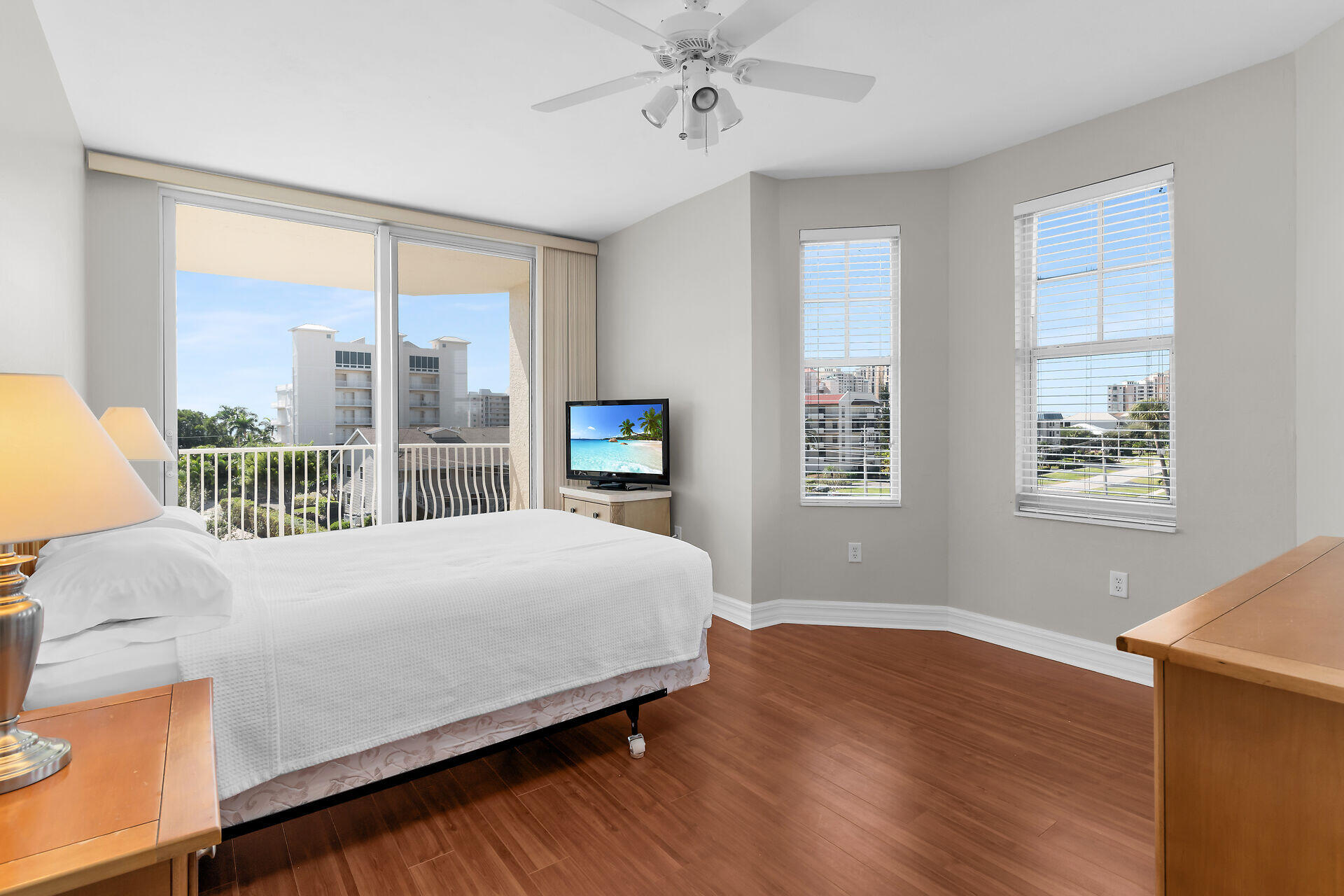 1111 Swallow Avenue, Unit 1401 Marco Island, FL 34145 - Photo 33 of 36 a bedroom with a large bed and a window