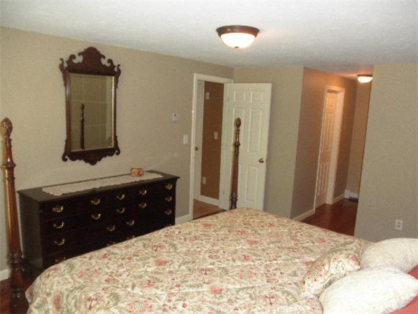 310 Wallum Lake Road Douglas, MA 01516 - Photo 12 of 19 a bedroom with a bed and a dresser