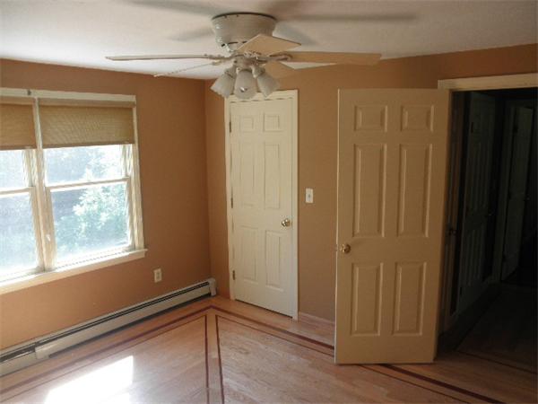 310 Wallum Lake Road Douglas, MA 01516 - Photo 15 of 19 a view of an empty room and window