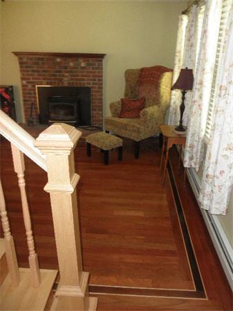 310 Wallum Lake Road Douglas, MA 01516 - Photo 17 of 19 a view of entryway and hall with wooden floor