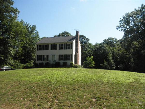 310 Wallum Lake Road Douglas, MA 01516 - Photo 2 of 19 a view of house with yard and trees in the background