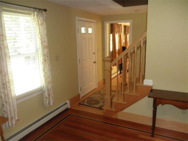 310 Wallum Lake Road Douglas, MA 01516 - Photo 9 of 19 a view of entryway and hall with wooden floor
